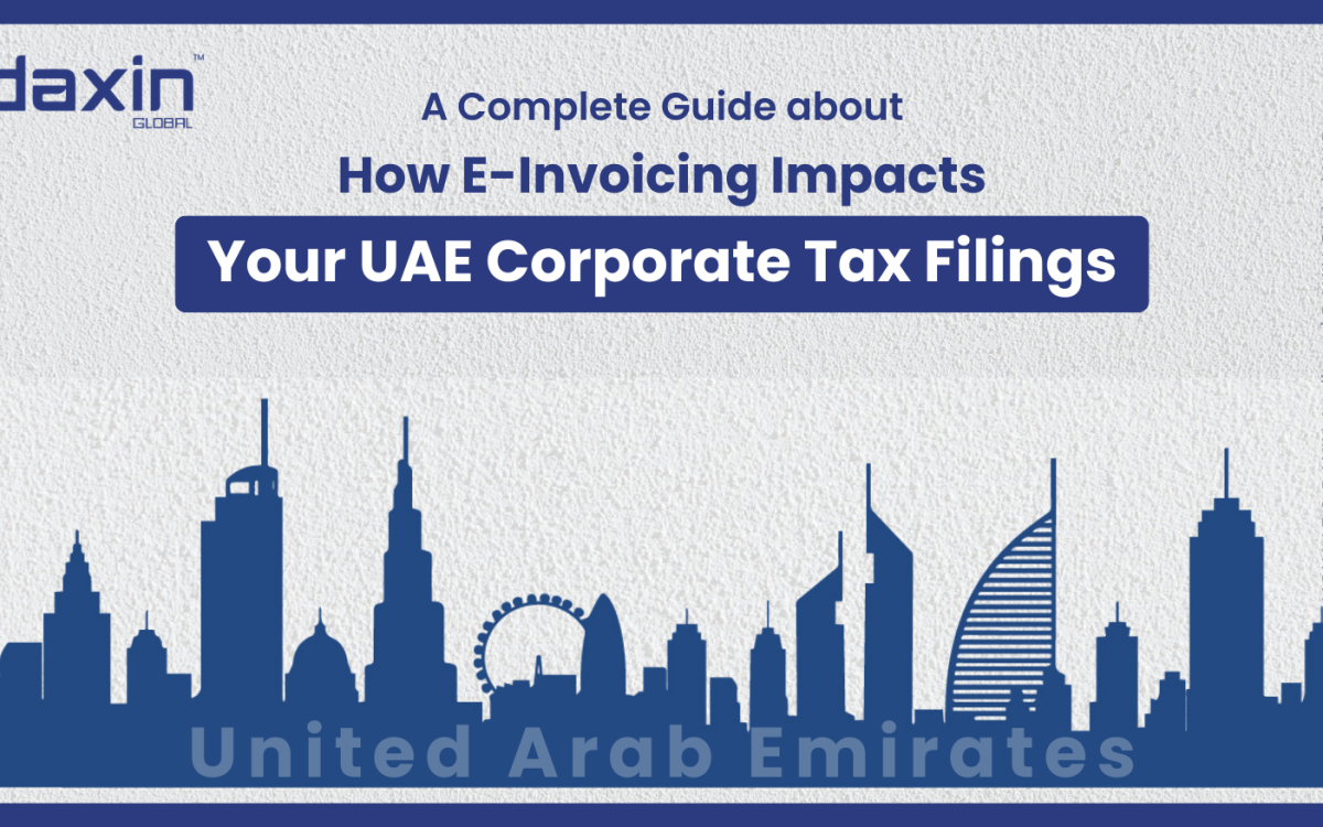 How E-Invoicing Impacts Your UAE Corporate Tax Filings — professionals reviewing digital invoices and tax reports.