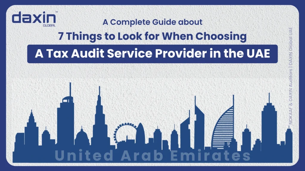 A professional corporate web banner featuring a dark blue silhouette of the United Arab Emirates skyline against a textured light grey background, displaying the Daxin Global logo and title text for a complete guide on 7 things to look for when choosing a tax audit service provider in the UAE.