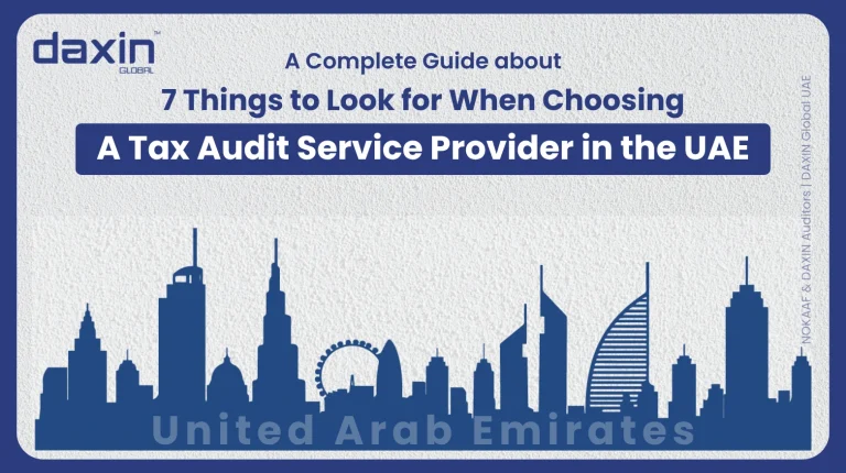 A professional corporate web banner featuring a dark blue silhouette of the United Arab Emirates skyline against a textured light grey background, displaying the Daxin Global logo and title text for a complete guide on 7 things to look for when choosing a tax audit service provider in the UAE.